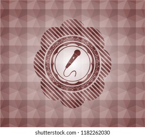 microphone icon inside red seamless geometric pattern emblem. Seamless.