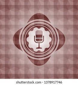 microphone icon inside red seamless polygonal badge.