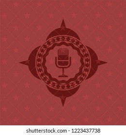 microphone icon inside retro red emblem