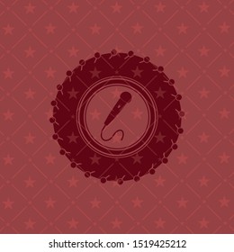 microphone icon inside retro red emblem