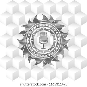microphone icon inside retro style grey emblem with geometric cube white background