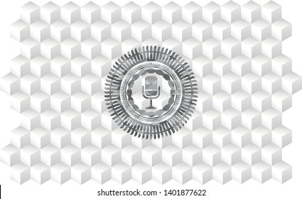 microphone icon inside retro style grey emblem with geometric cube white background