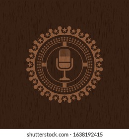 microphone icon inside retro style wood emblem