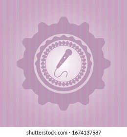 microphone icon inside retro style pink emblem