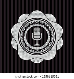 microphone icon inside silver badge