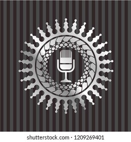 microphone icon inside silver shiny emblem