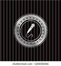 microphone icon inside silvery shiny emblem