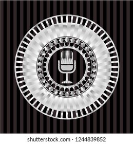 microphone icon inside silvery shiny emblem