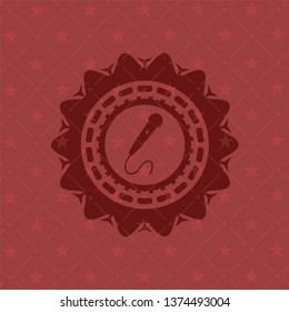 microphone icon inside vintage red emblem