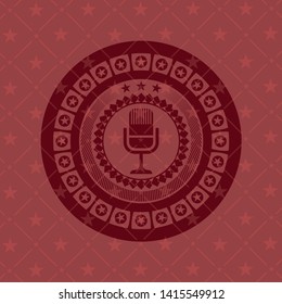 microphone icon inside vintage red emblem