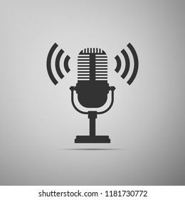 Microphone icon isolated on grey background. On air radio mic microphone. Speaker sign. Flat design. Vector Illustration