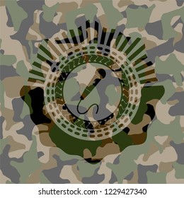 microphone icon on camouflage texture