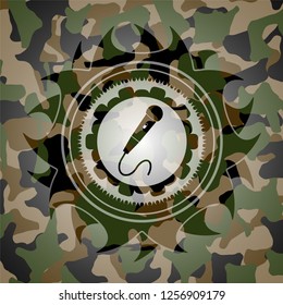 microphone icon on camouflage texture
