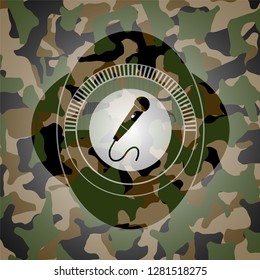 microphone icon on camouflage texture