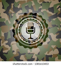 microphone icon on camouflaged texture