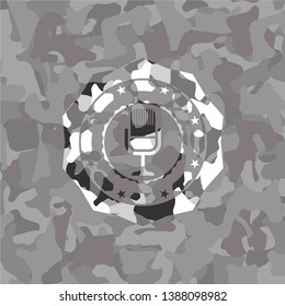 microphone icon on grey camouflage texture