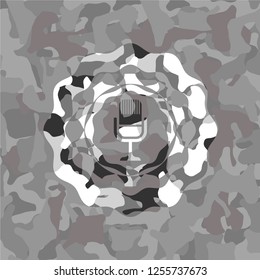 microphone icon on grey camouflaged pattern