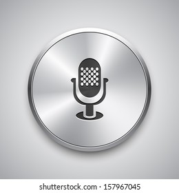 Microphone icon on metal button.