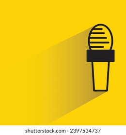 microphone icon with shadow on yellow background