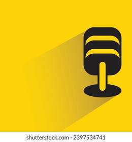 microphone icon with shadow on yellow background