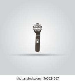 Microphone isolated vector black icon