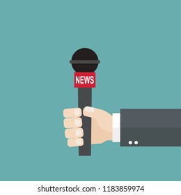 Microphone in journalist hand