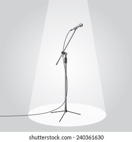 The microphone on the stage under the spotlights. EPS10 vector illustration.