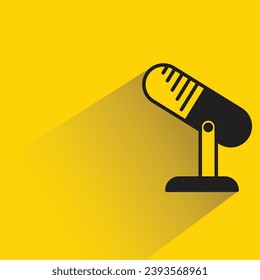 microphone on stand icon with shadow on yellow background