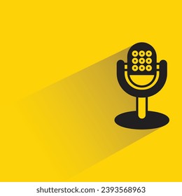 microphone on stand icon with shadow on yellow background