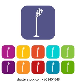 Microphone on stand icons set vector illustration in flat style in colors red, blue, green, and other