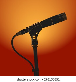 Microphone on vintage sunburst background