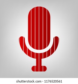 Microphone sign illustration. Vector. Vertically divided icon with colors from reddish gradient in gray background with light in center.