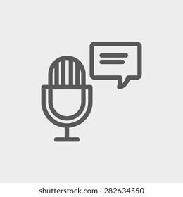 Microphone with speech bubble icon thin line for web and mobile, modern minimalistic flat design. Vector dark grey icon on light grey background.