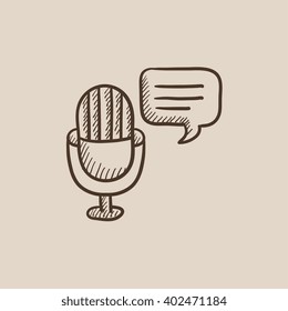 Microphone with speech square sketch icon.