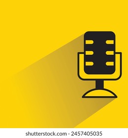 microphone and stand icon with shadow on yellow background
