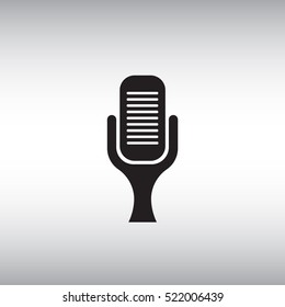 Microphone vector icon. Isolated microphone vector sign. Flat vector microphone illustration.