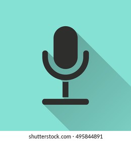 Microphone vector icon with long shadow. black Illustration isolated on green background for graphic and web design.