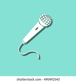 Microphone vector icon with shadow. White illustration isolated on green background for graphic and web design.