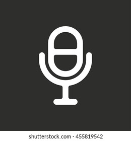 Microphone vector icon. White illustration isolated on black background for graphic and web design.