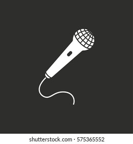 Microphone vector icon. White illustration isolated on black background for graphic and web design.