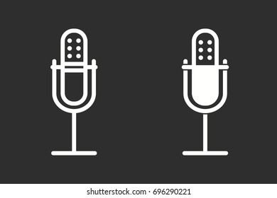 Microphone vector icon. White illustration isolated on black background for graphic and web design.