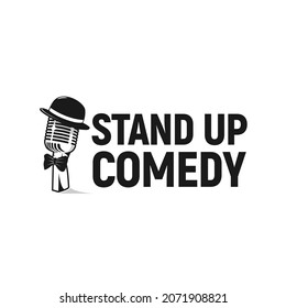 microphone wearing a hat in a stand up comedy show