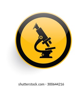 Microscope icon design on yellow button background,clean vector