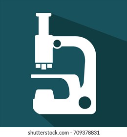 microscope icon in white color isolated on green background
