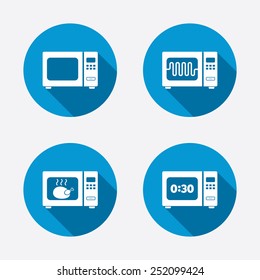 Microwave oven icons. Cook in electric stove symbols. Grill chicken with timer signs. Circle concept web buttons. Vector