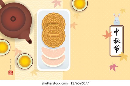 Mid autumn festival template or copy space. Mooncakes and pomelo with chinese teapot and tea on beige background. (caption: Mid autumn festival, 15th Aug)