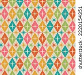  Mid century modern atomic starburst on retro diamond shapes seamless pattern in teal, green, orange, pink and yellow. For home décor, textile and fabric