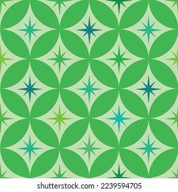 Mid century modern atomic starbursts in lime green, mint green, blue and teal on green circle seamless pattern. For home décor, wallpaper and textile