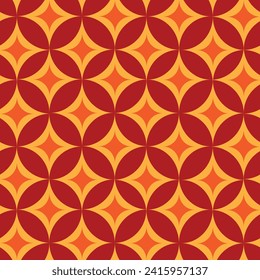 Mid Century Modern orange and yellow atomic starbursts seamless pattern on red background. For wallpaper, fabric and home décor 