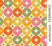 Mid century modern retro starburst on colorful circles in yellow, green, red and orange seamless pattern. For textile, home décor and fabric